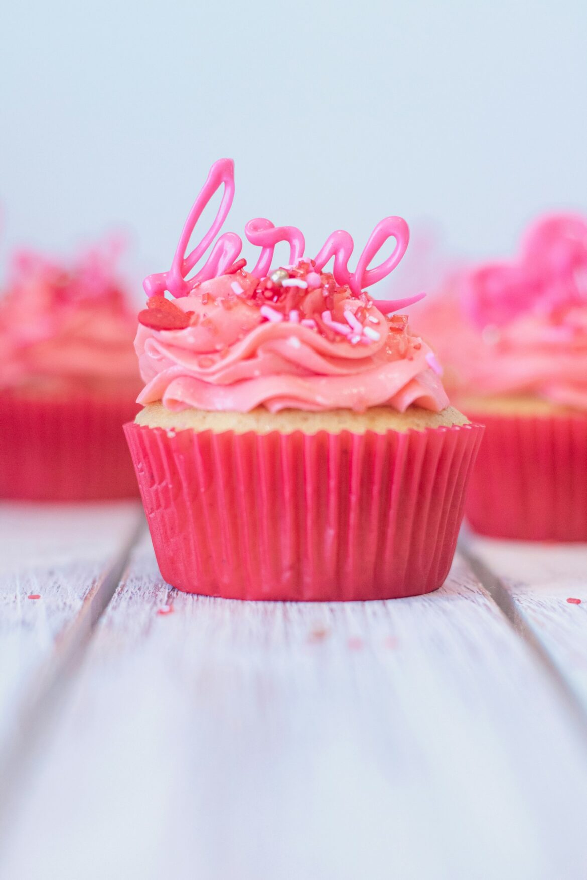 Cupcake topped with swirled pink icing