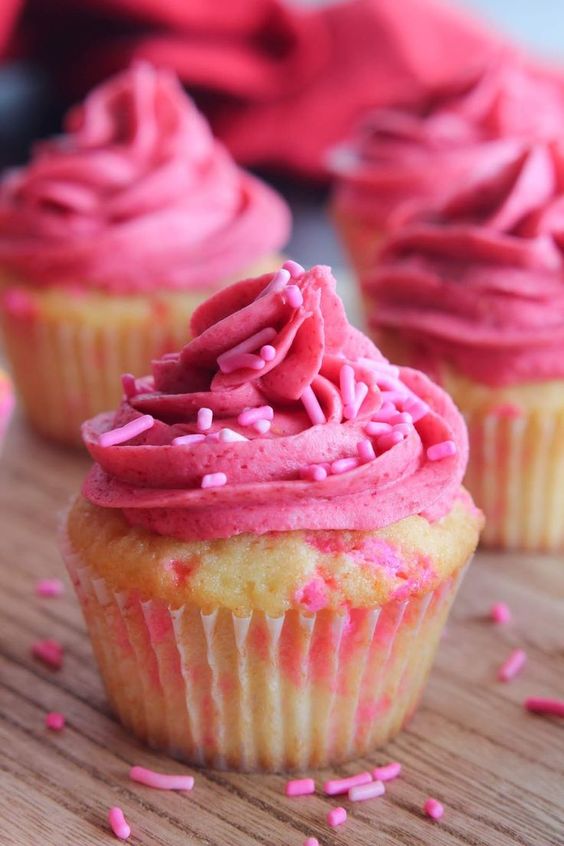 pink funfetti cupcakes with raspberry buttercream